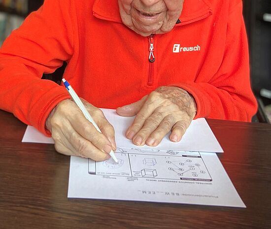 aged person writing a test